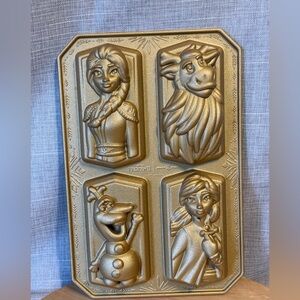 This is a Nordic Ware Disney Frozen 2 Cast Character Cakelet Pan. VG Condition